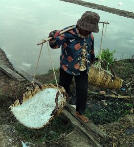 Kampot saltflats worker